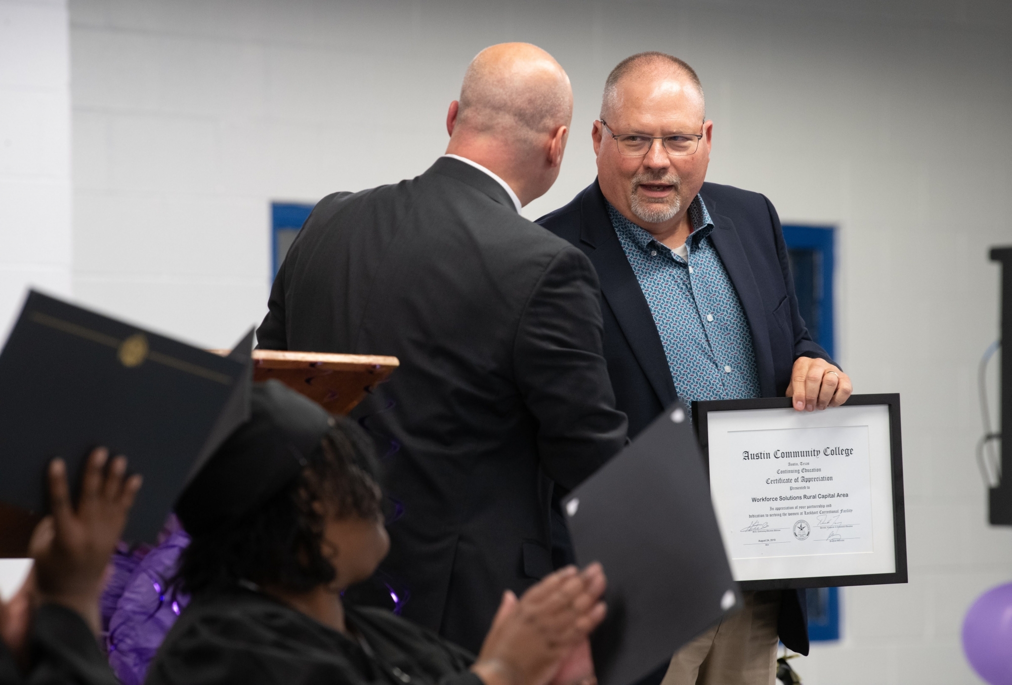 WSRCA CEO Paul Fletcher accepting a Certificate of Appreciation from ACC's Don Tracy